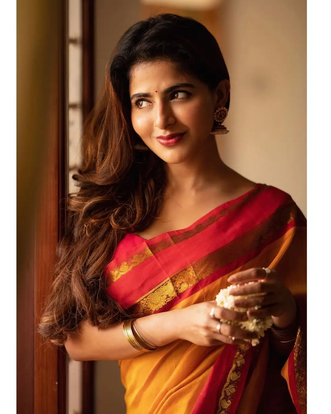 Indian Girl Iswarya Menon In Traditional Orange Saree Sleeveless Blouse